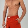 DUSKITTEN ECLIPSE LINE · Swim Shorts — campaign shot 1